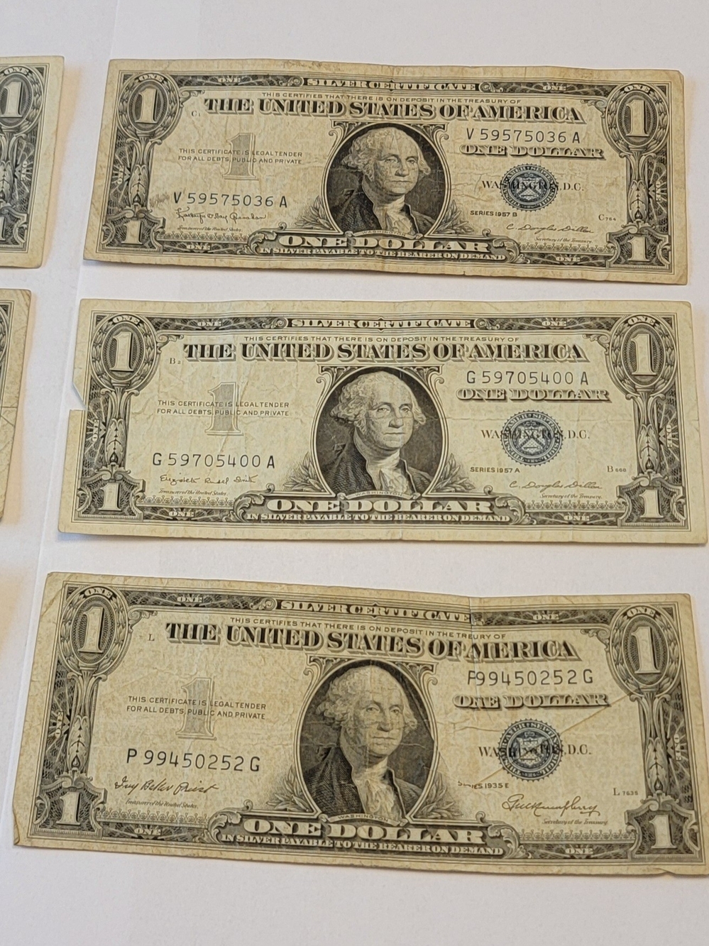 Collection of 7 US Silver Certificate One Dollar Bills
